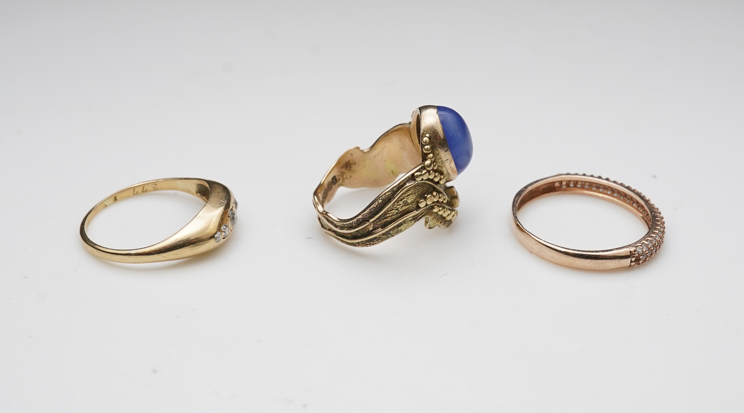Three gold rings